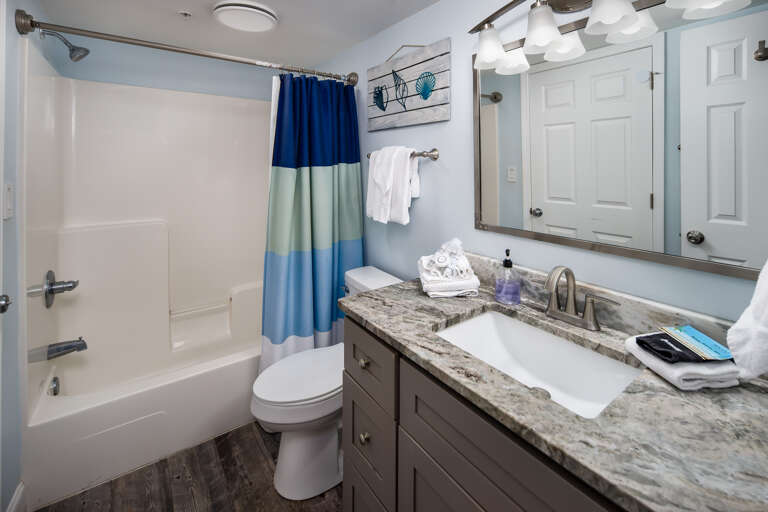 First floor full bathroom with shower/tub combo