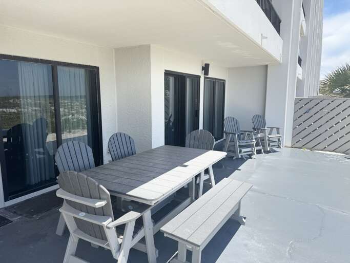 Gulf front back porch with dining table Gulf front back porch with dining table