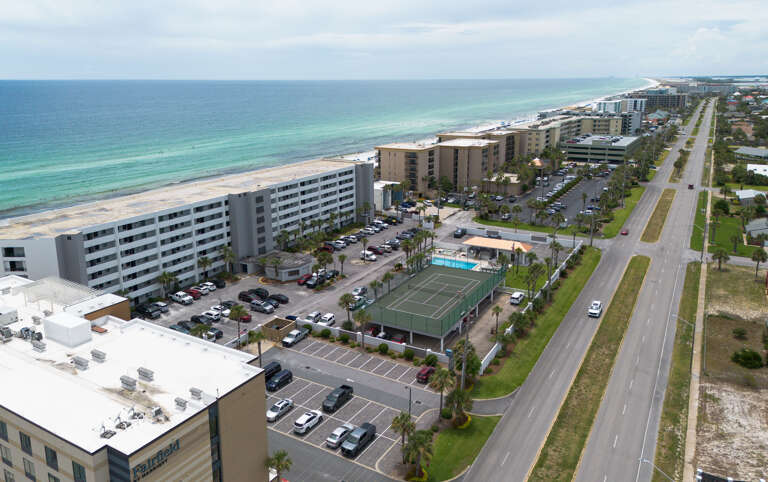 Aerial views Surf Dweller with parking lot