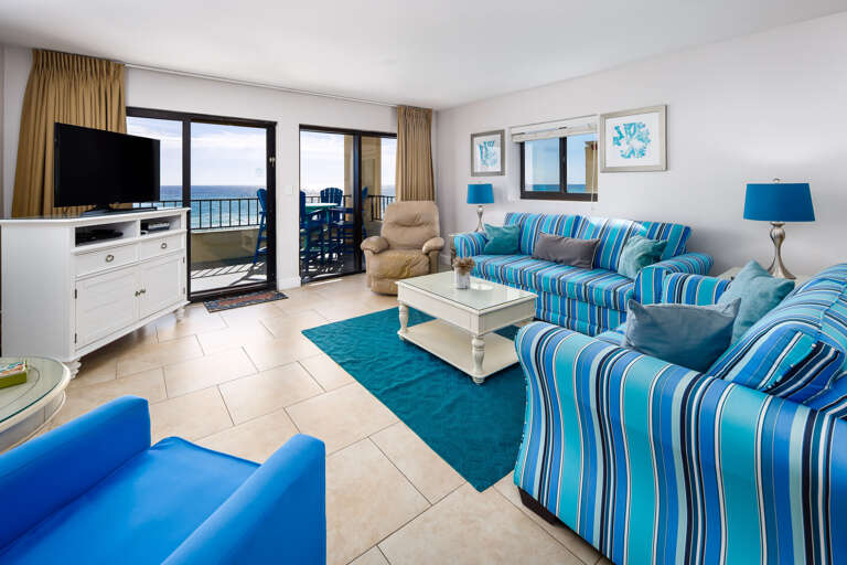 Relax in the living room while over looking the emerald green waters