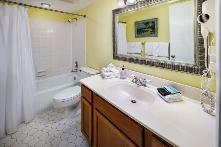 Second full size bathroom with shower/tub combo