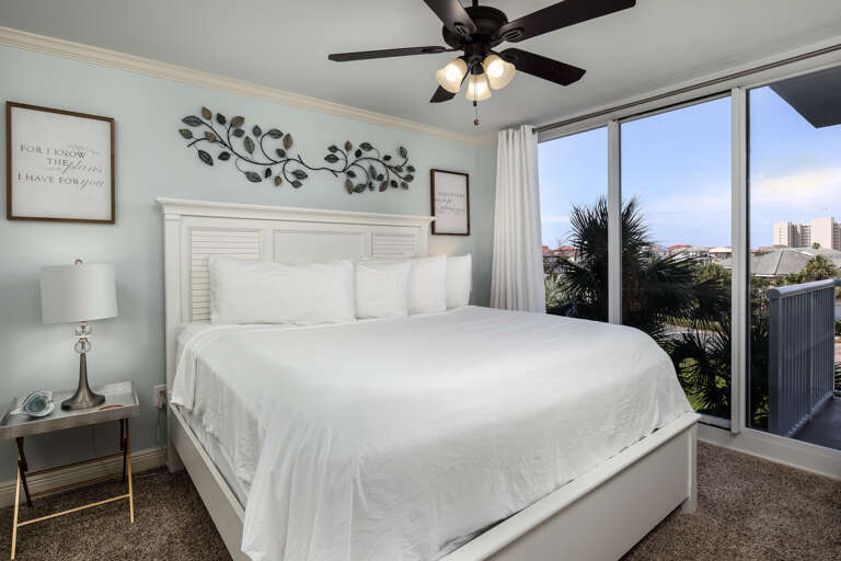 Master bedroom with a king size bed and private bathroom