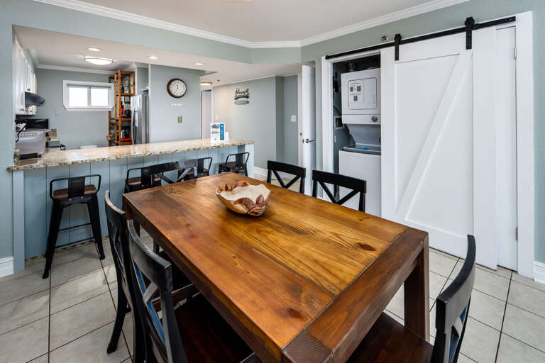 Dining area/breakfast bar/and washer and dryer
