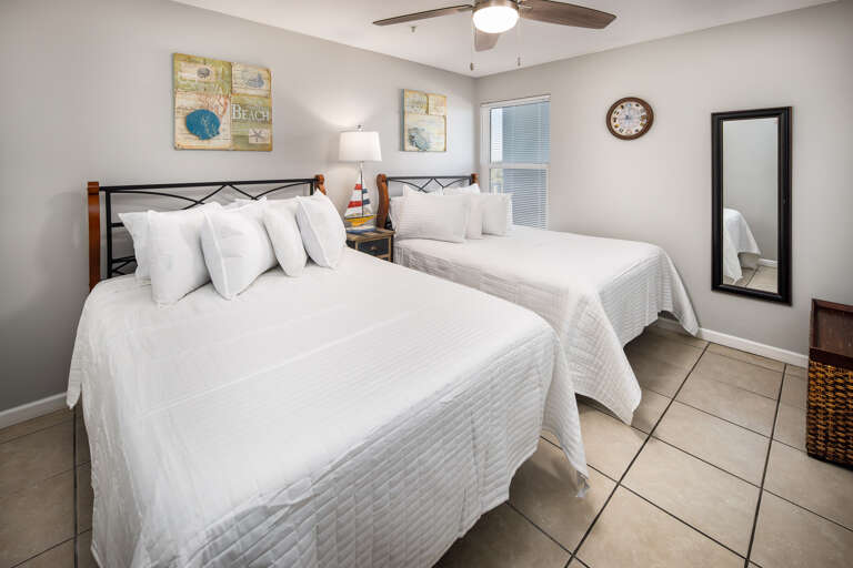 Second bedroom with two full size beds Second bedroom with two full size beds