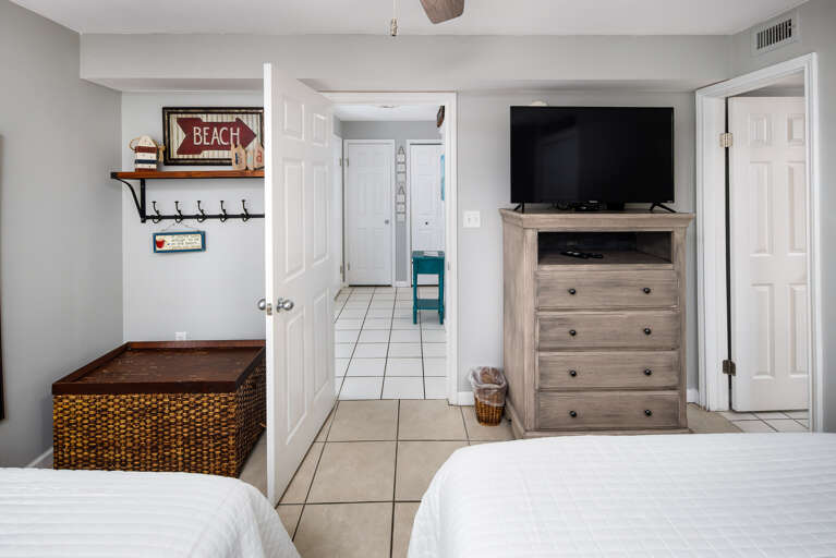 Second bedroom with two full size beds and TV Second bedroom with two full size beds and TV