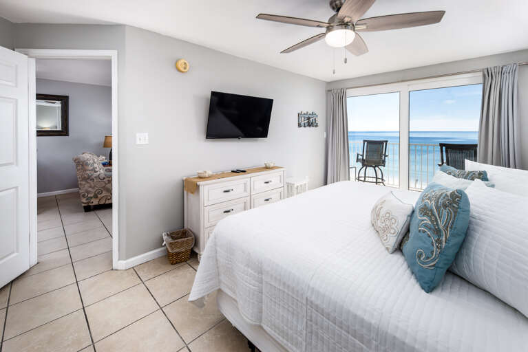 Master bedroom with beach views and balcony access Master bedroom with beach views and balcony access