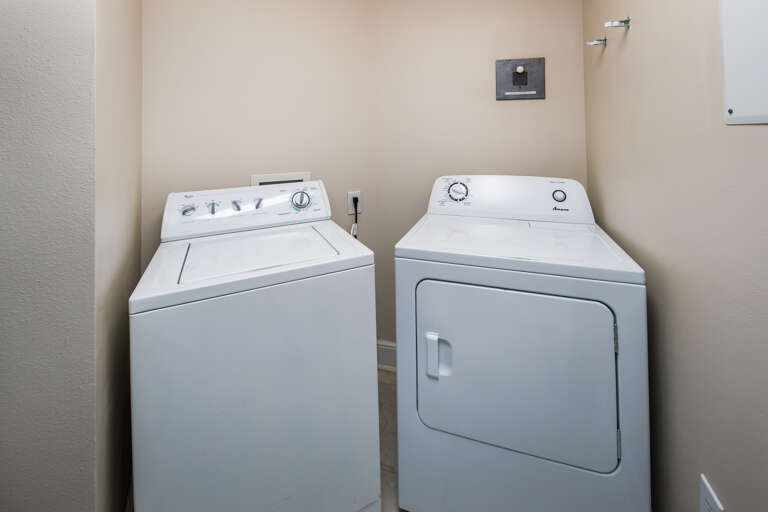Laundry room with full size washer and dryer