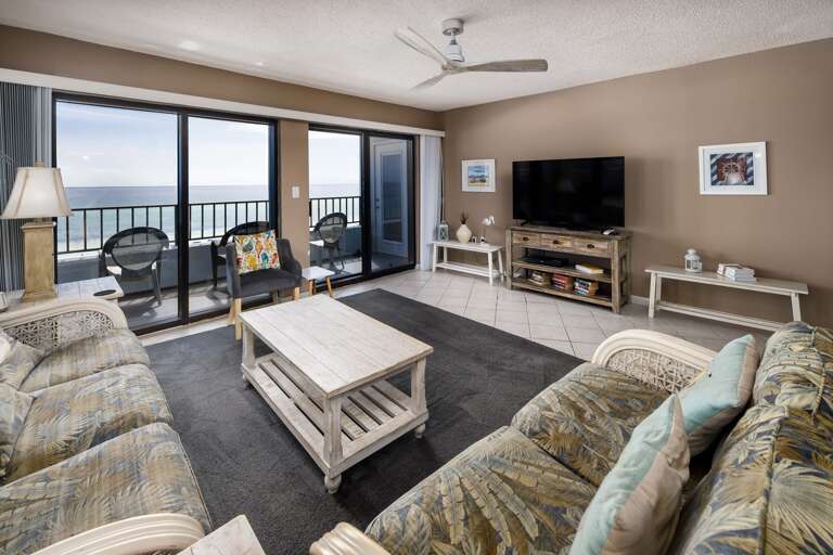 Living room with TV and balcony access