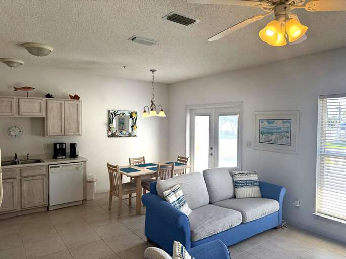 Living/Dining room area with doors to outdoor patio Living/Dining room area with doors to outdoor patio