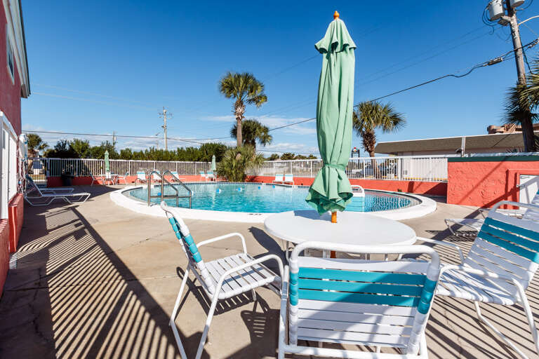 Enjoy a meal alongside the pool with your family