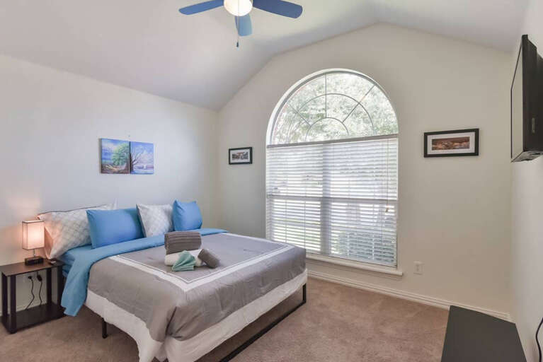 Third Bedroom with a view to the front of the home and a ton of space throughout!