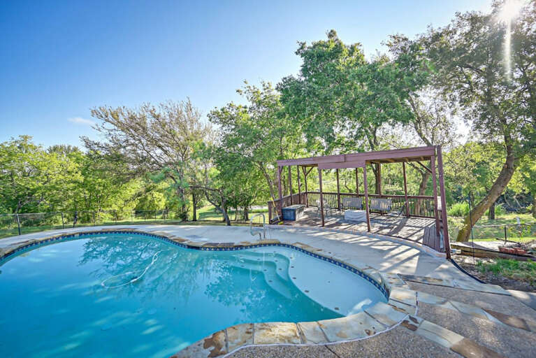 Pool view of second deck with shaded seating area