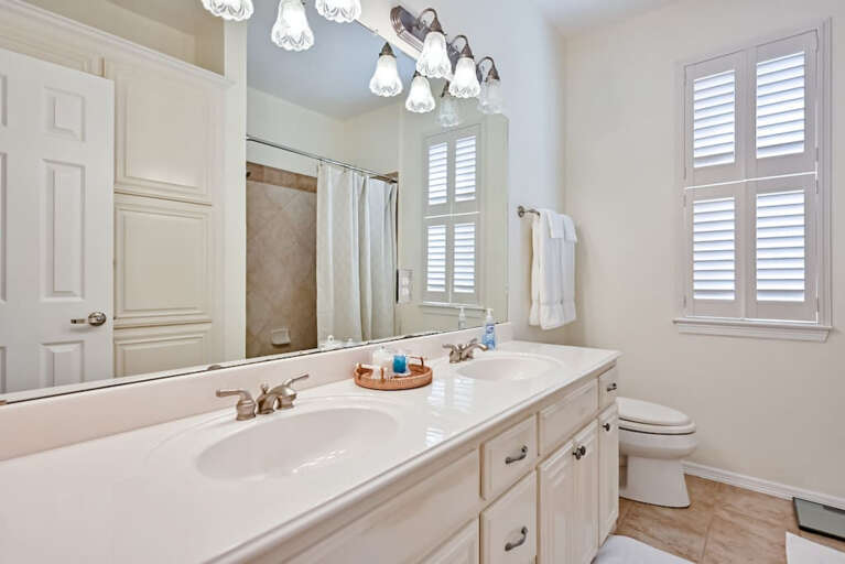 Dual sink vanity in upstairs bathroom