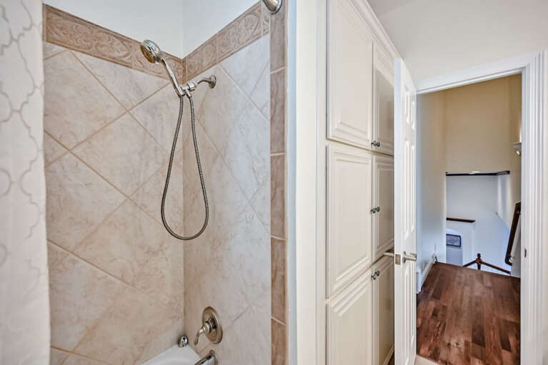 Upstairs full bathroom with adjustable showerhead