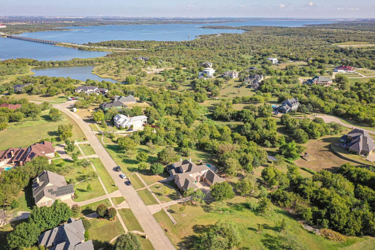 Aerial view of home with Joe Pool Lake close in the background
