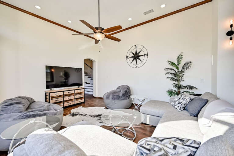 Second living area with plenty of seating and lounging room for streaming your favorite show or movie. Large sectional with two oversized beanbag chairs.