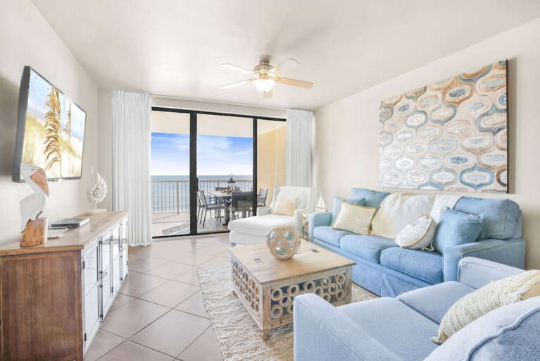 Living Room view toward balcony door and ocean view Living Room view toward balcony door and ocean view