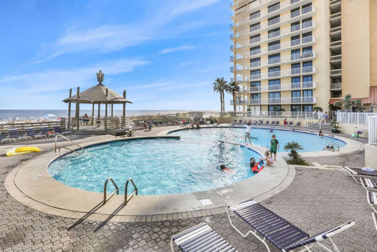 Central pool between beach and building Central pool between beach and building