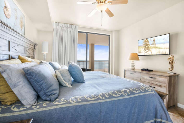 View from master bedroom, with KING size bed, to balcony door and ocean view View from master bedroom, with KING size bed, to balcony door and ocean view