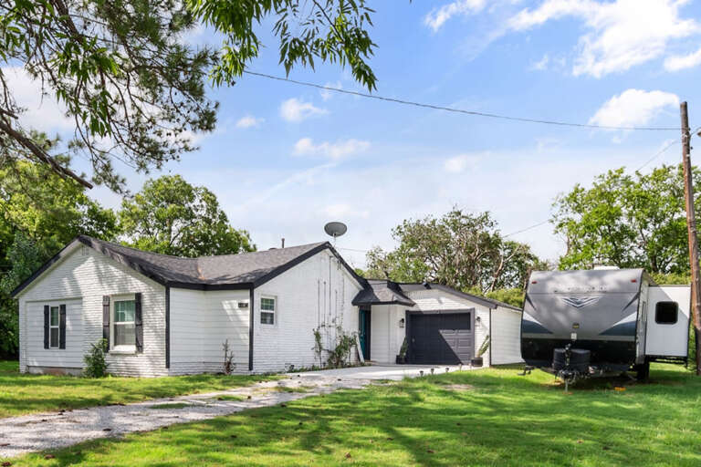 Front Yard view of front of property, RV not included in this listing, please ask about listing with RV