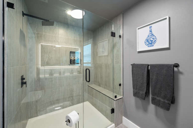 Primary En-Suite Bathroom with Glass Stand-Up shower with in shower seat