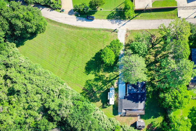 Aerial Photos above property and lot showing lot and open lot next to it for use