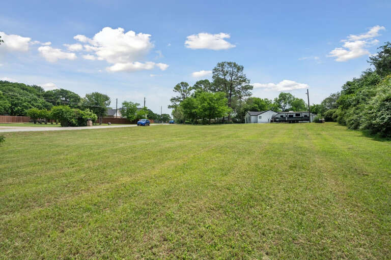 View of the road leading to the house from the end of the property