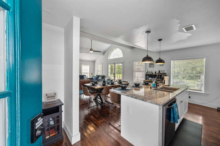 View from Entryway Door into kitchen and living areas