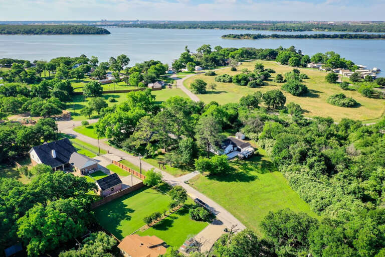 Aerial Photos above property showing what is behind and around it right near the lake