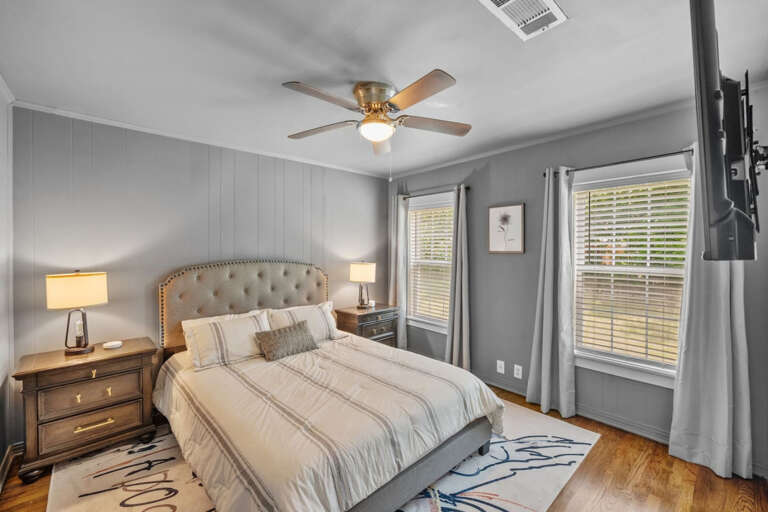 2nd bedroom with Queen Bed, Smart TV, and closet