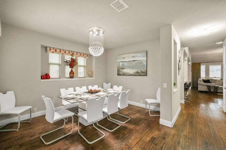 Front Dining, with seating of 6-8 people, located right after entering front door with view toward living room