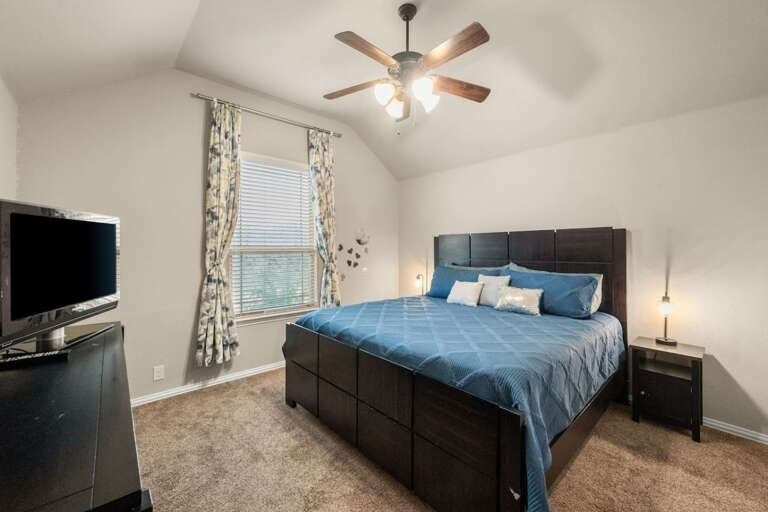 2nd Floor secondary bedroom with King Bed, TV with streaming, nightstands and lamps on either side