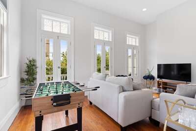 view of the living room, comes with a foosball table!