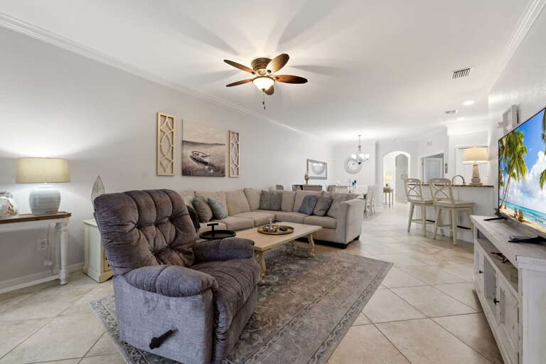 Comfortable seating for the whole group, with an easy sightline into the kitchen and dining area.