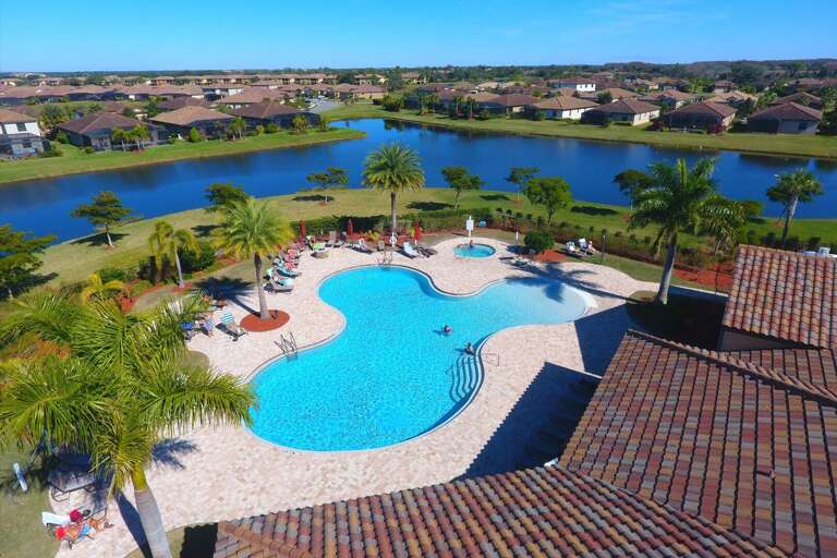 Community pool with tons of loungers just a short walk or bike ride from the villa.
