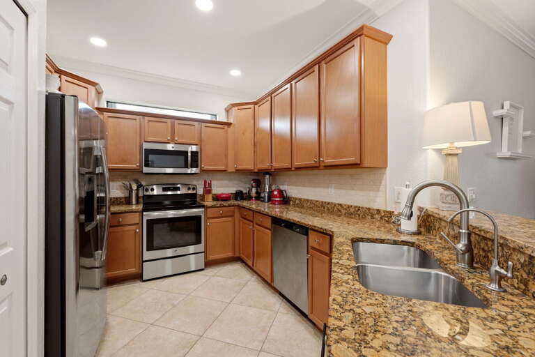 Deep sink and easy-reach storage make cleanup simple.