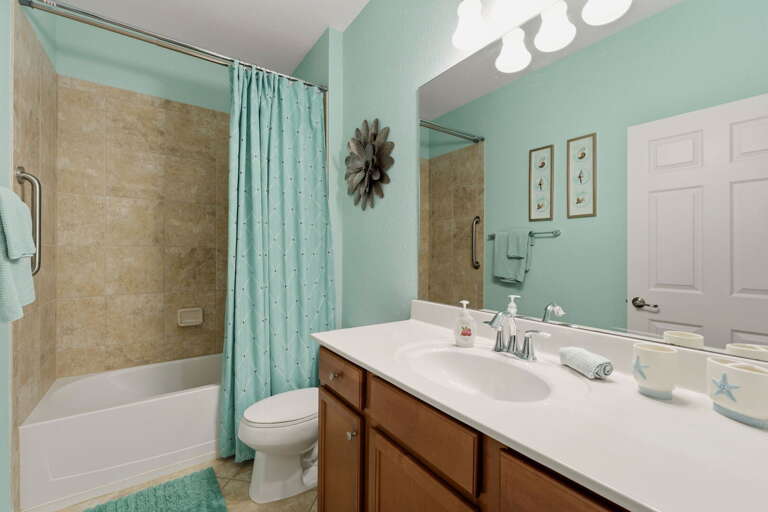The second full bathroom has a tub/shower combo and single vanity.