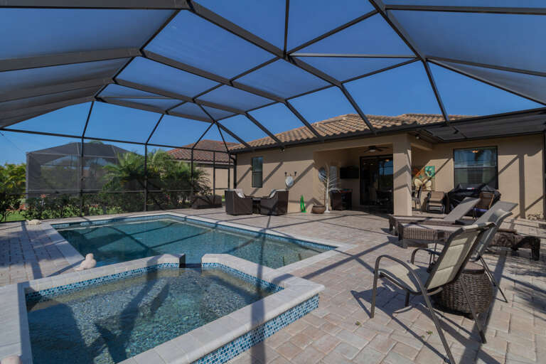 Spacious pool deck with plenty of seating