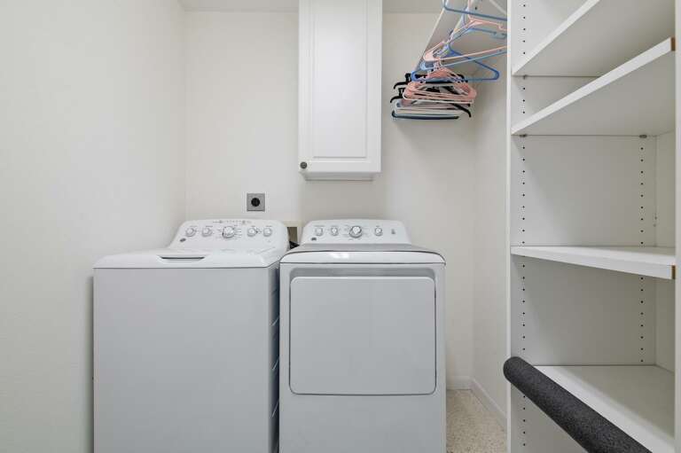 Walk in closet with washer and dryer for your use