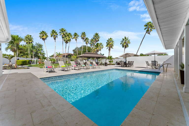 Claim your lounger, flip on the umbrella, and let the afternoon stretch out. The pool is big enough that no one has to fight for a spot — there's room for everyone.