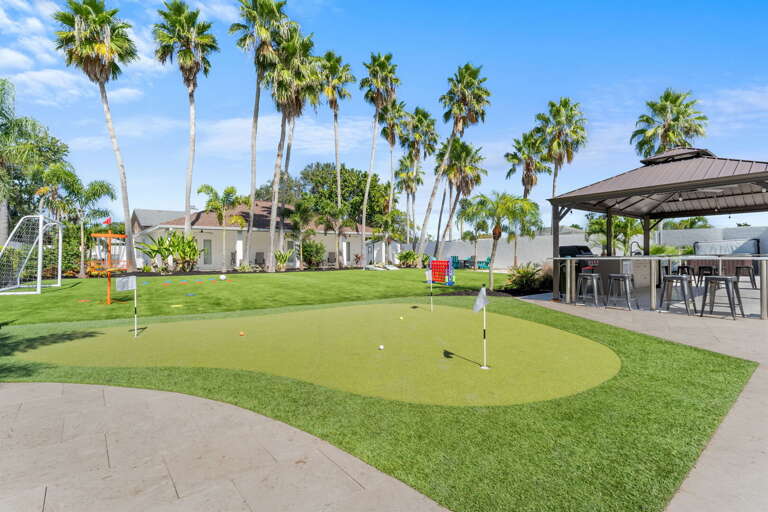 Your putting green, soccer goal, disc golf basket, and outdoor kitchen are all within steps of each other — the whole crew stays busy without leaving.