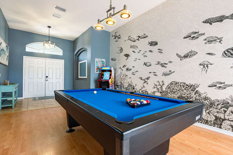 Play pool, rack up arcade credits, or just take in the ocean mural — your game room is open 24/7