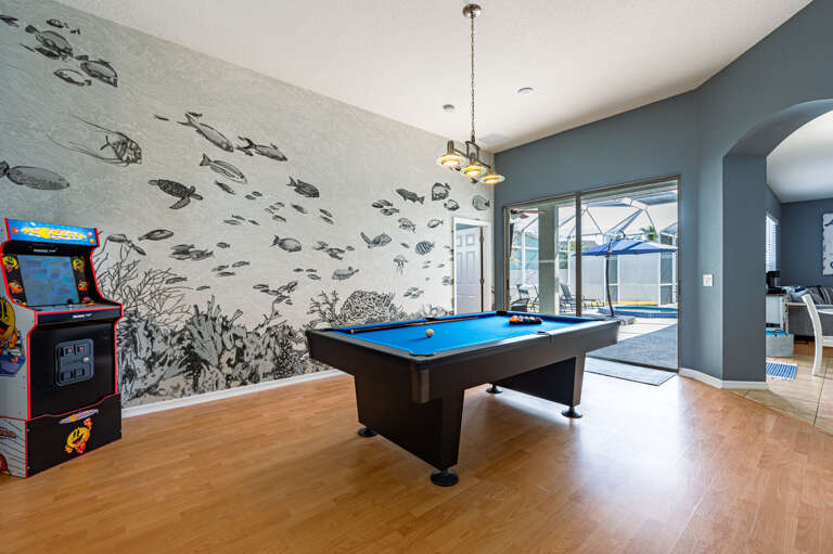 Walk from the game room straight to the pool deck — vacation mode has never been this easy to find