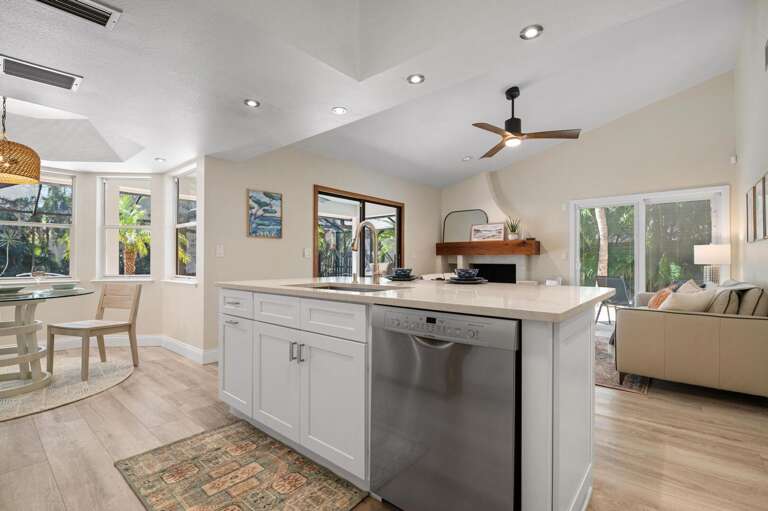 Load the dishwasher without missing a beat of what's happening in your living room just beyond.