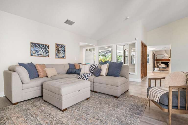 Prop your feet up on the ottoman and glance toward the fireplace room. Round two of relaxing is right there for you.