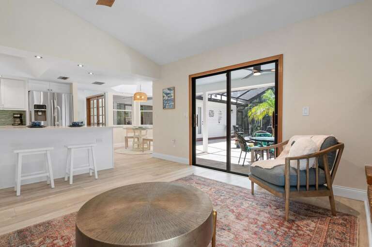 Settle by the fireplace once the evening cools down and leave the sliding doors open for the patio breeze.
