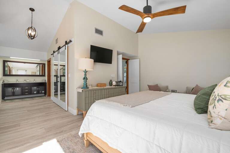Slide the barn door shut behind you and the ensuite becomes entirely yours for as long as you want.