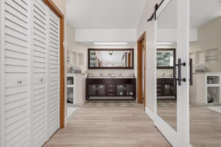 Unpack everything into your walk-in closet and never live out of a suitcase for your whole stay.