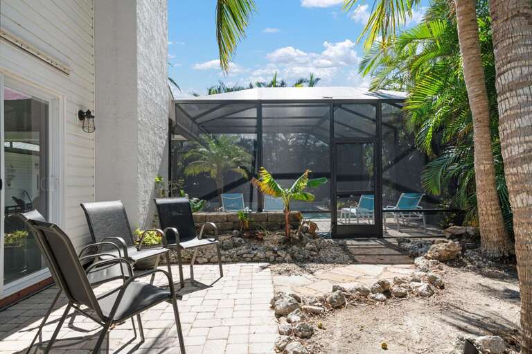 Wander the side path past the landscaping and you'll find the pool gate before you finish your coffee.