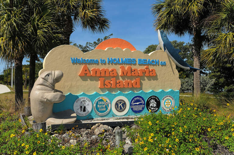 You're on the Cortez side but Anna Maria Island's famous Holmes Beach is a short golf cart ride away